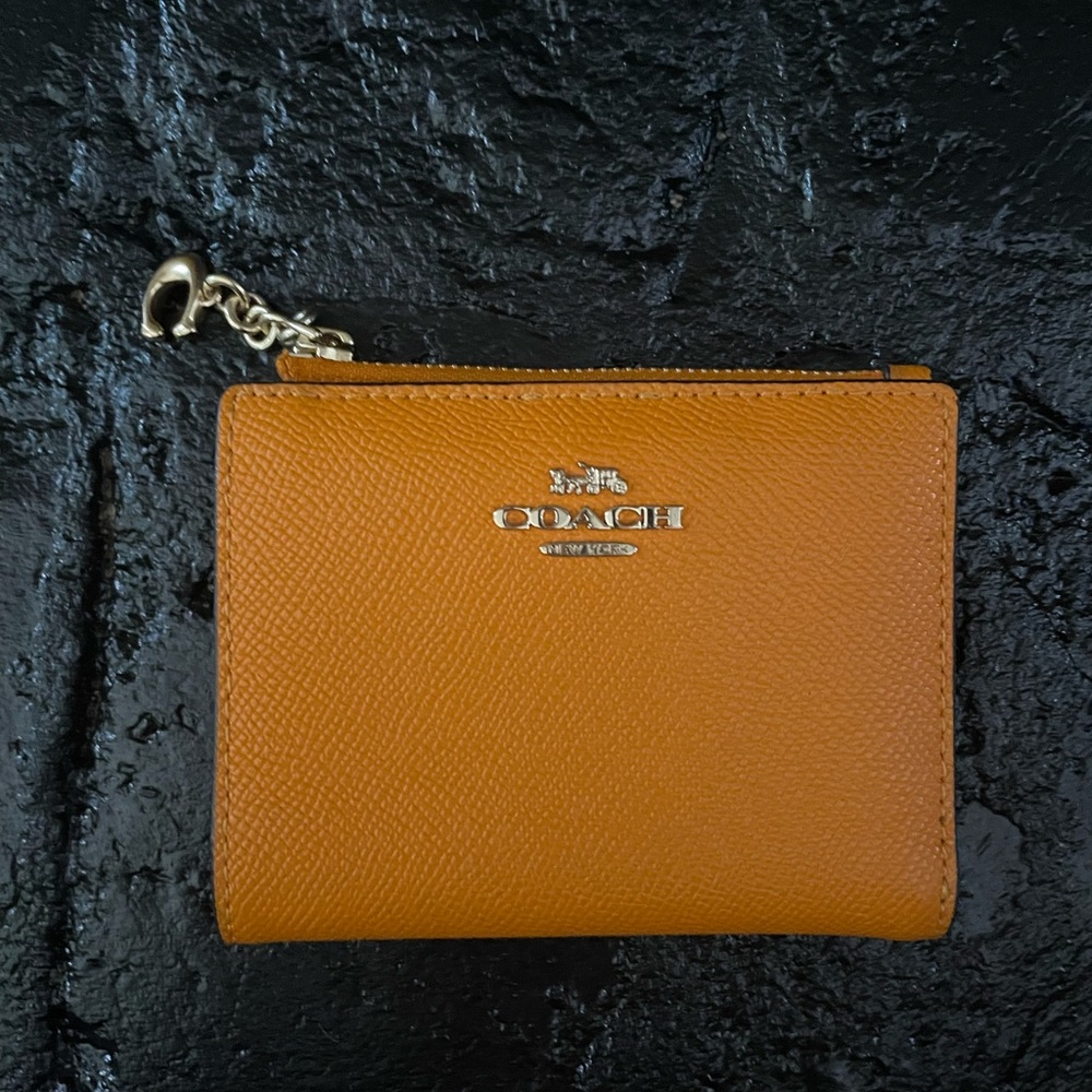 Gorgeous orange leather compact coach wallet